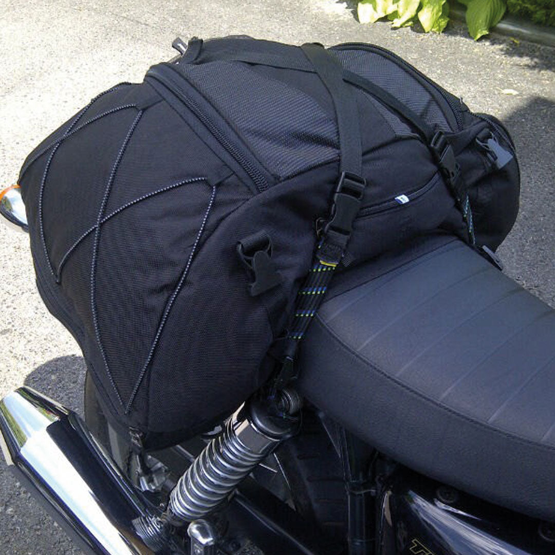 ROKStraps Motorcycle / ATV Stretch Straps securing luggage on the back of a bike using quick-release buckles, showing strong flat strap in use